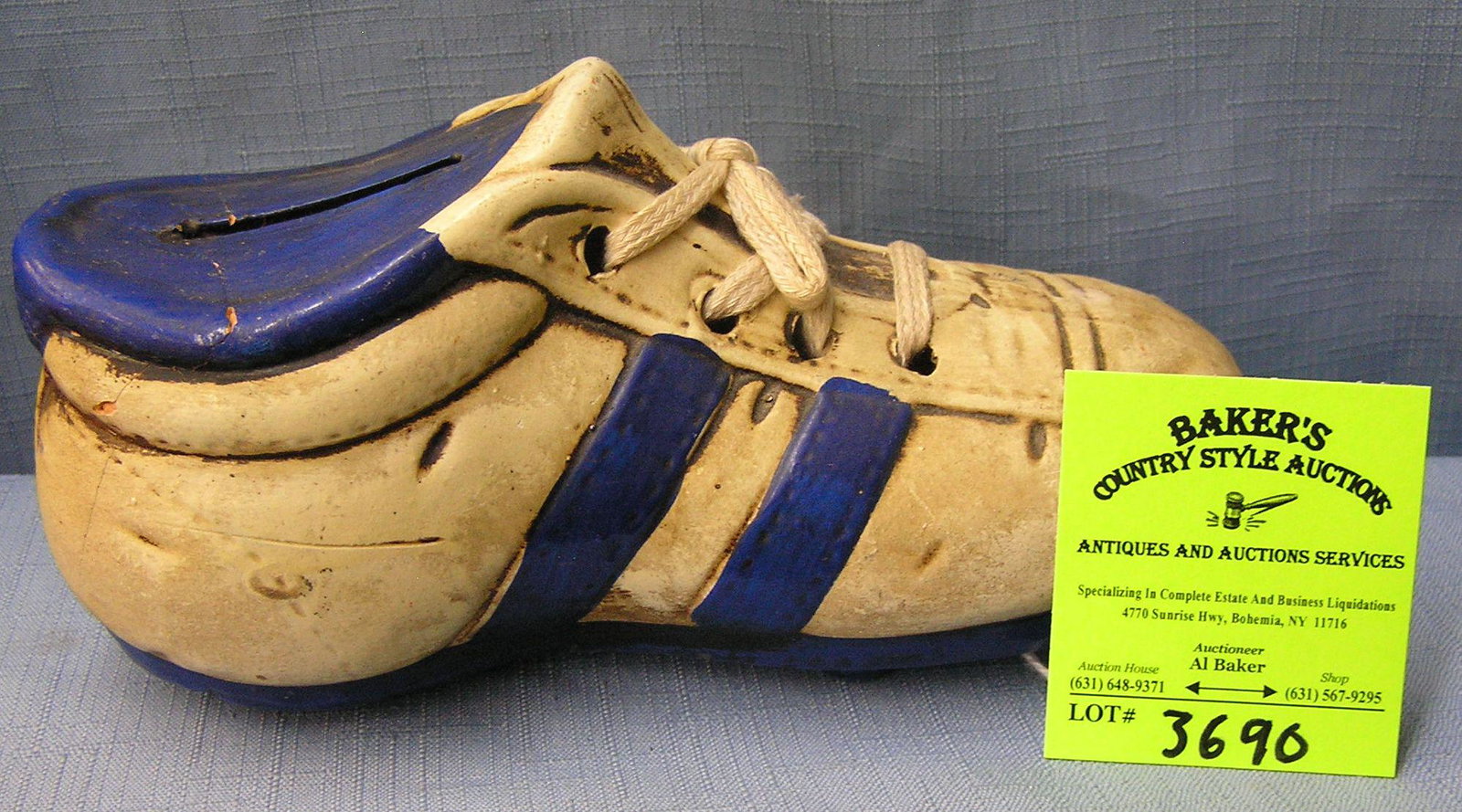 Vintage painted sneaker bank: Vintage painted sneaker bank est. value $35.00-$40.00