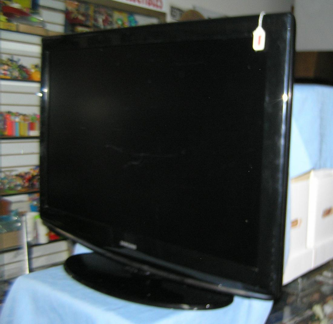 Large Samsung flat screen TV: Large Samsung flat screen TV 25 inches high by 39 inches wide part of a moving and storage Co. seized merchandise liquidation est. value $125.00-$150.00