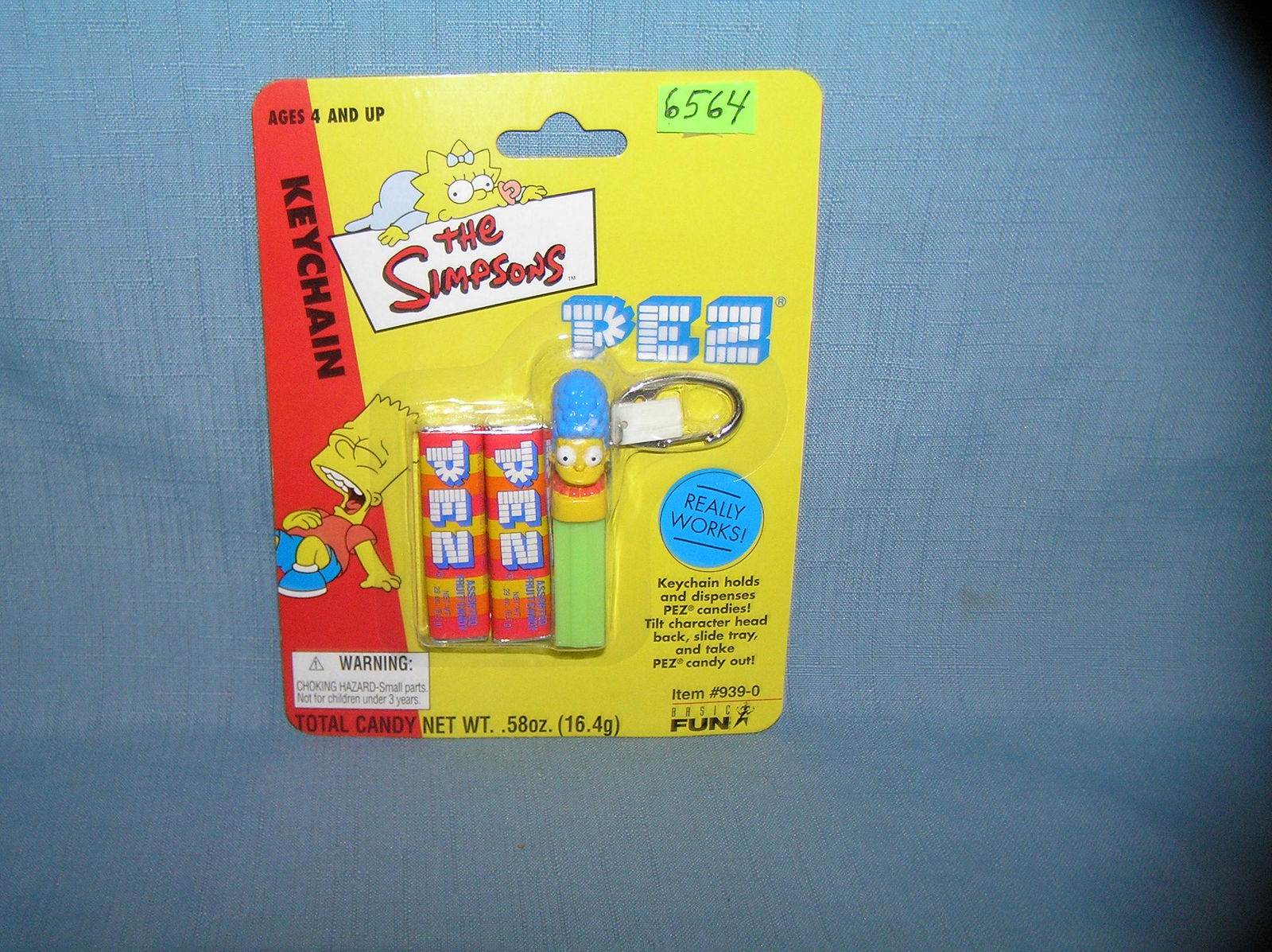 Vintage Simpson PEZ candy container and Key chain: Vintage Simpson PEZ candy container and key chain mint on card est. value $15.00-$20.00