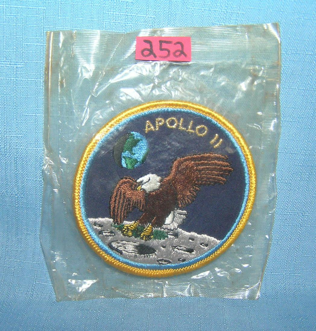Rare Apollo 11 large first man on the moon landing: Rare Apollo 11 large hand embroidered first man on the moon landing patch still factory packaged as distributed by Nasa space program est. value $35.00-$45.00