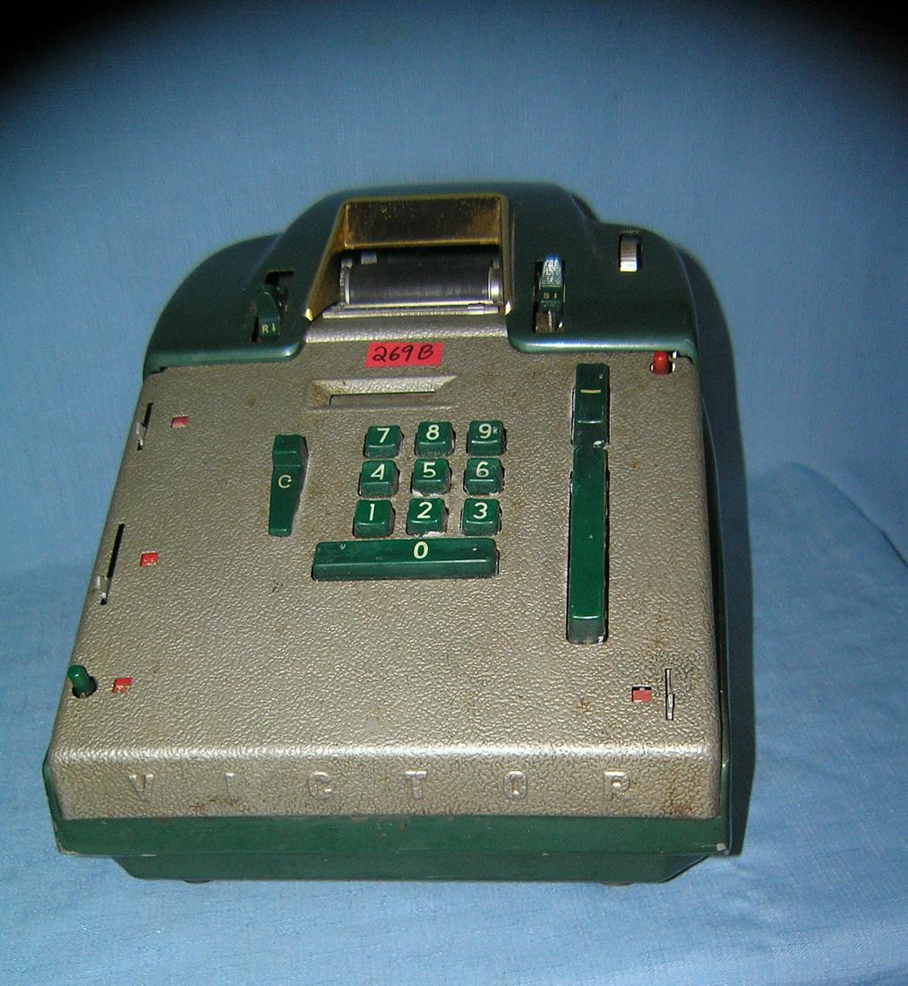 Great early Victor adding machine: Great early Victor adding machine brass, metal and Bakelite constuction made by the Victor Adding Machine Co. Chicago IL est. value $200.00-$225.00