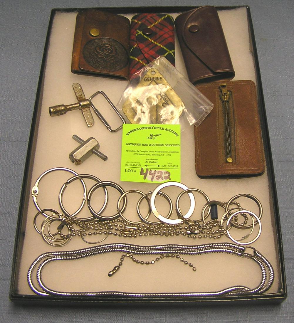 Collection of key chains, holders and more: Collection of key chains, holders and more est. value $30.00-$40.00