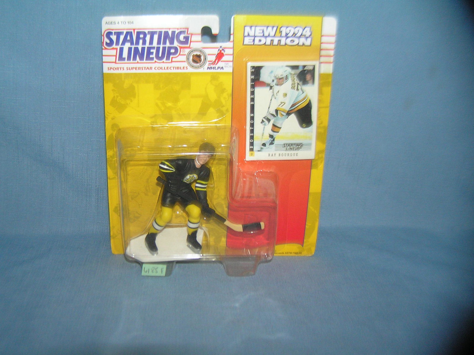 Ray Bourque hockey figure and sport card: Ray Bourque hockey figure and sport card mint on card est. value $25.00-$30.00
