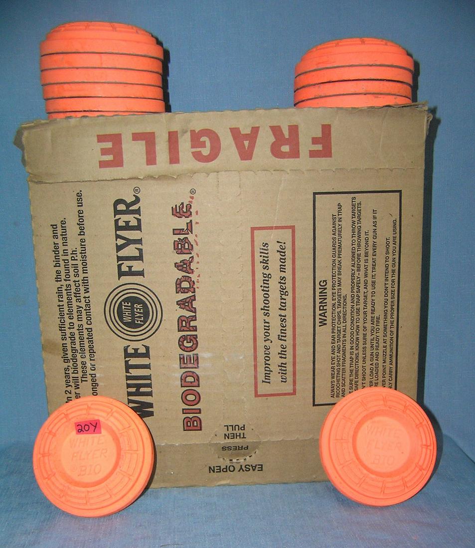Box of White Flyer biodegradable shot gun targets: Box of White Flyer biodegradable clay pidgin shot gun targets part of a moving and storage Co. seized merchandise liquidation est. value $40.00-$45.00