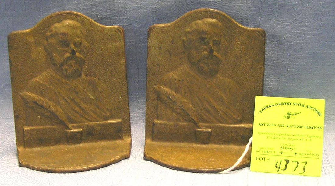iron bookends featuring Henry W. Longfellow: Pair of antique figural cast iron bookends featuring famous writer Henry W. Longfellow $150.00-$175.00