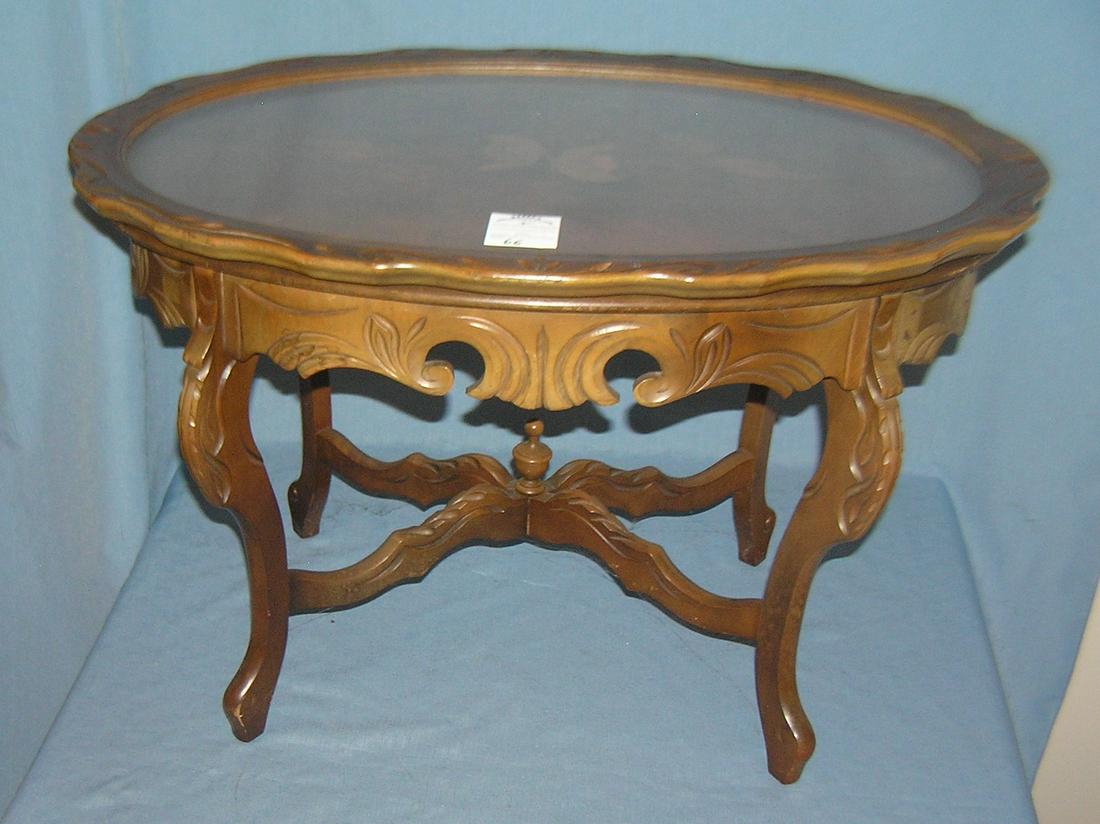 inlaid coffee table with glass serving tray: Floral decorated inlaid coffee table with glass serving tray est. value $175.00-$200.00