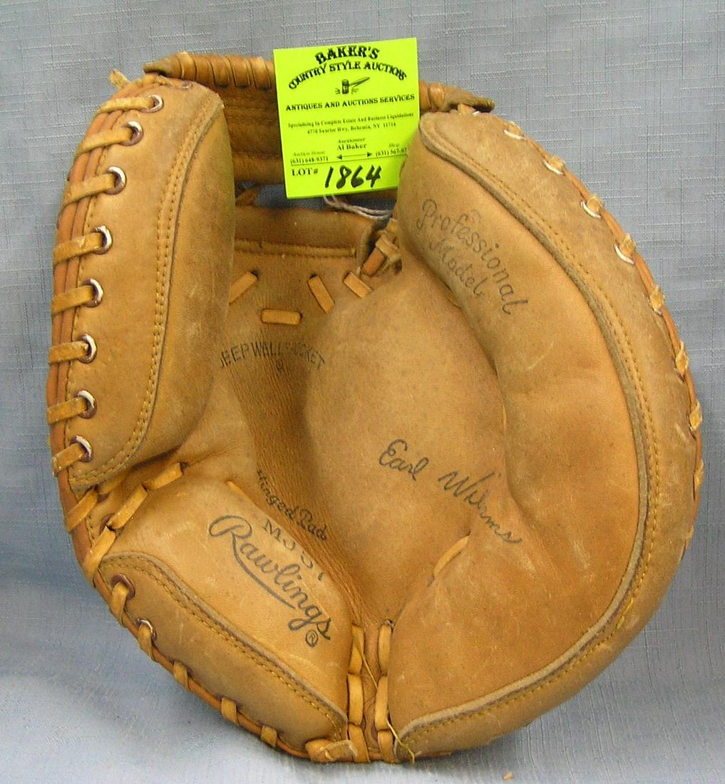 Vintage leather Earl Williams catcher’s mitt: Vintage leather Earl Williams catcher’s mitt est. value $50.00-$75.00