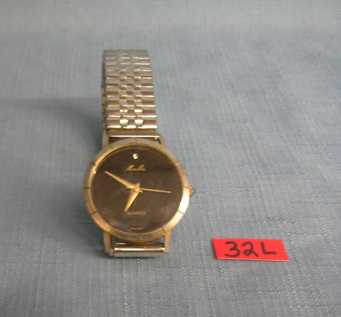 Moulin quartz gentleman's wrist watch: Moulin quartz gentleman's wrist watch circa 1960's-70's very good condition est. value $40.00-$50.00