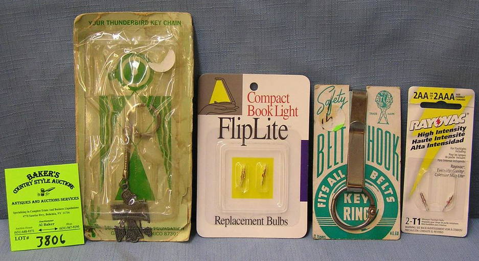 Group of four key chains and accessories Dec 21, 2021 Baker's