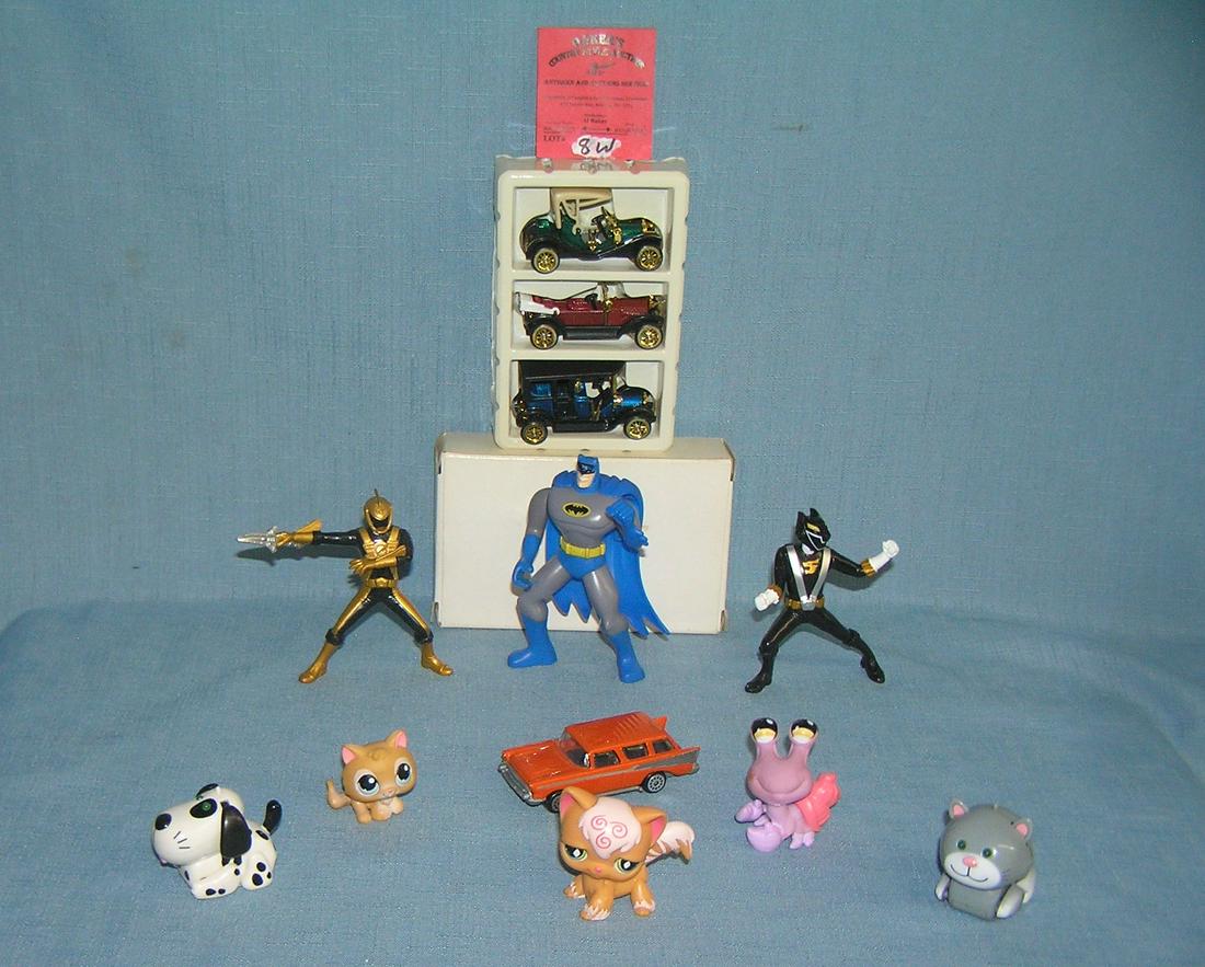 Collection of vintage toys featuring Batman and more: Collection of vintage toys featuring Batman, Power Rangers, toy cars and more est. value $35.00-$45.00