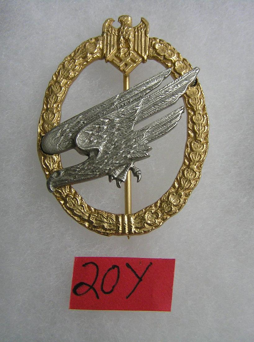 German Army Paratropper badge WWII style: German Army Paratropper badge gold and silver colored WWII style high quality reproduction collectors, re-enactors,historical or theatrical collectors piece est. value $75.00-$80.00
