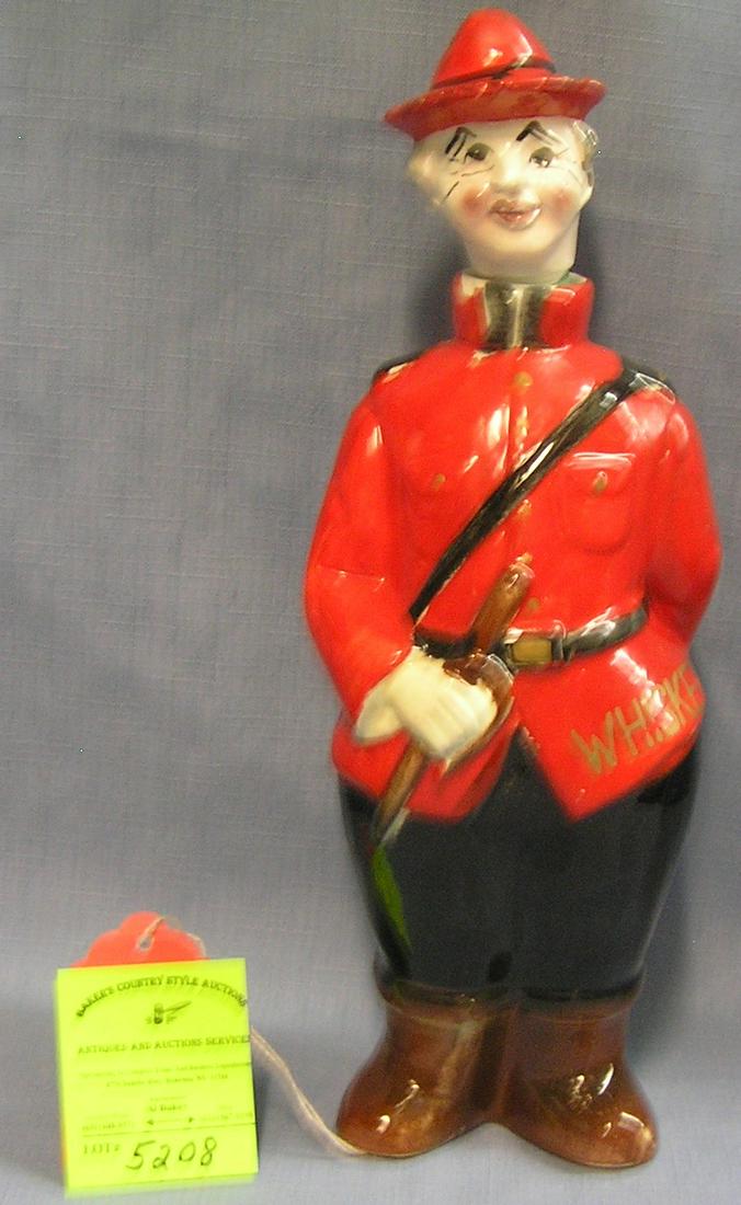 Figural Canadian mounted policeman liquor decanter: Figural Canadian mounted policeman liquor decanter est. value $100.00-$125.00