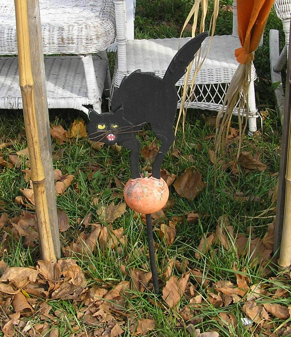 Vintage wooden black cat on a pumpkin: Vintage wooden black cat on a pumpkin Halloween display piece est. value $40.00-$45.00