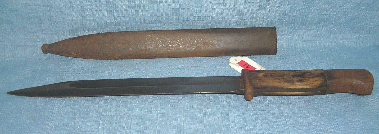 WWII bayonet and scabbard: WWII bayonet and scabbard est. value $250.00-$275.00