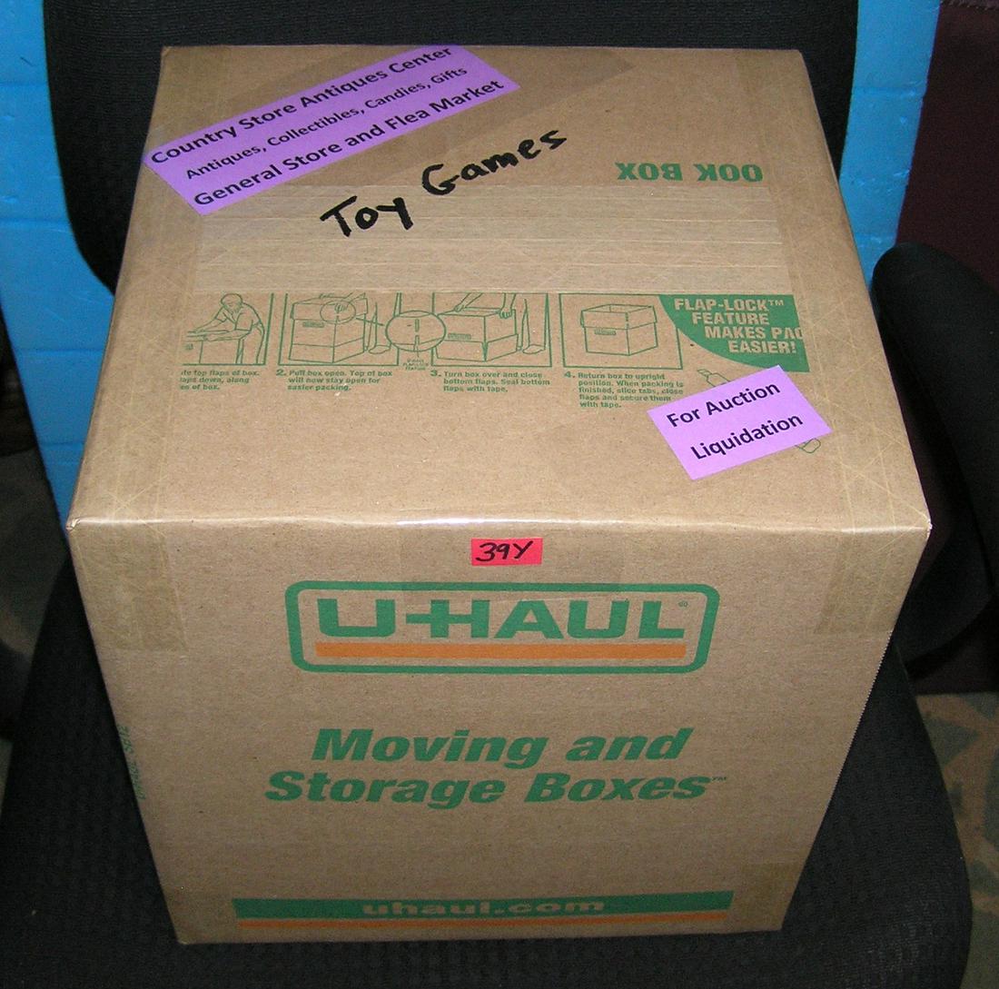 Moving and Storage Company mystery box lot: Moving and Storage Company mystery box lot marked The Country Store Antiques Center: Antiques, Collectibles, Candies, Gifts, Toy Games General Store and Flea Market part of a moving and storage compan