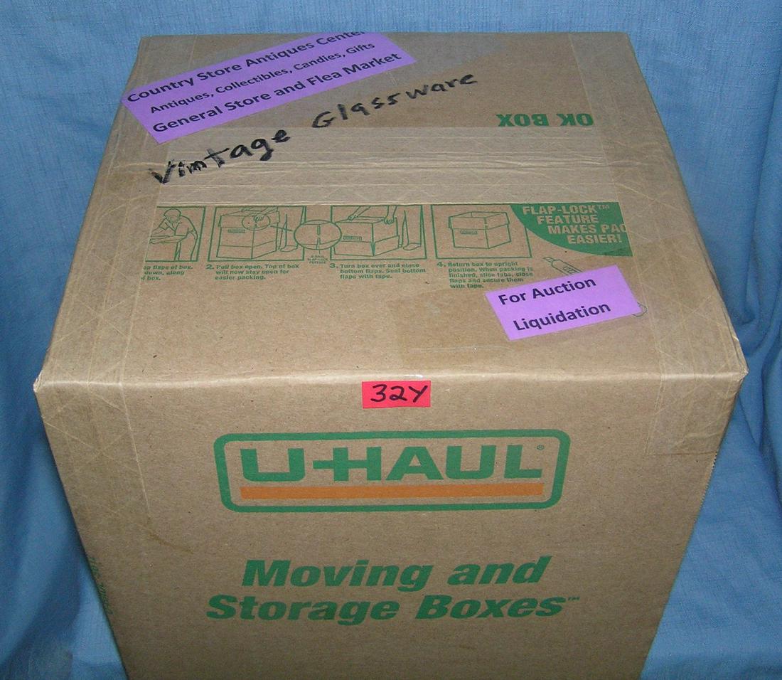 Moving and Storage Company mystery box lot: Moving and Storage Company mystery box lot marked The Country Store Antiques Center: Antiques, Collectibles, Candies, Gifts, General Store and Flea Market and vintage glassware part of a moving and st