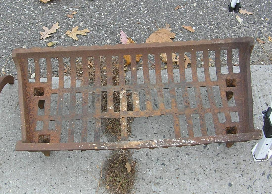 Cast iron full size fireplace log holder: Cast iron full size fireplace log holder est. value $65.00-$75.00