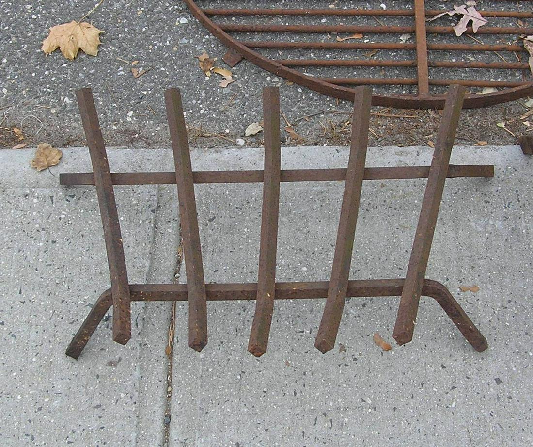 Cast iron fireplace log holder: Cast iron fireplace log holder est. value $65.00-$75.00