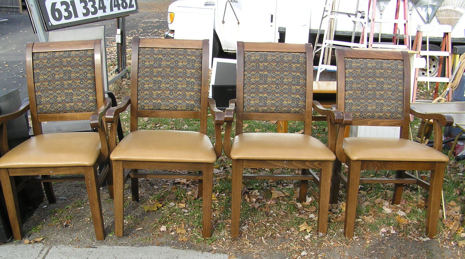 Set of 8 Maxwell Thomas dining room chairs: Set of 8 Maxwell Thomas of Canada custom desighner dining room chairs all walnut with leather seat and padded back customer to arrange pickup or shipping est. value $1500.00-$2000.00