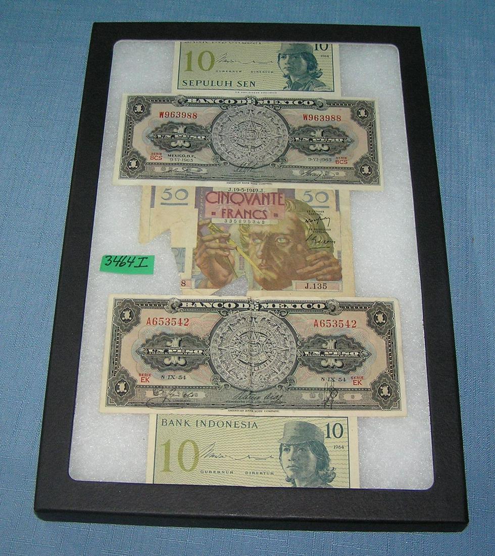 Group of vintage World currency: Group of vintage World currency est. value $75.00-$80.00