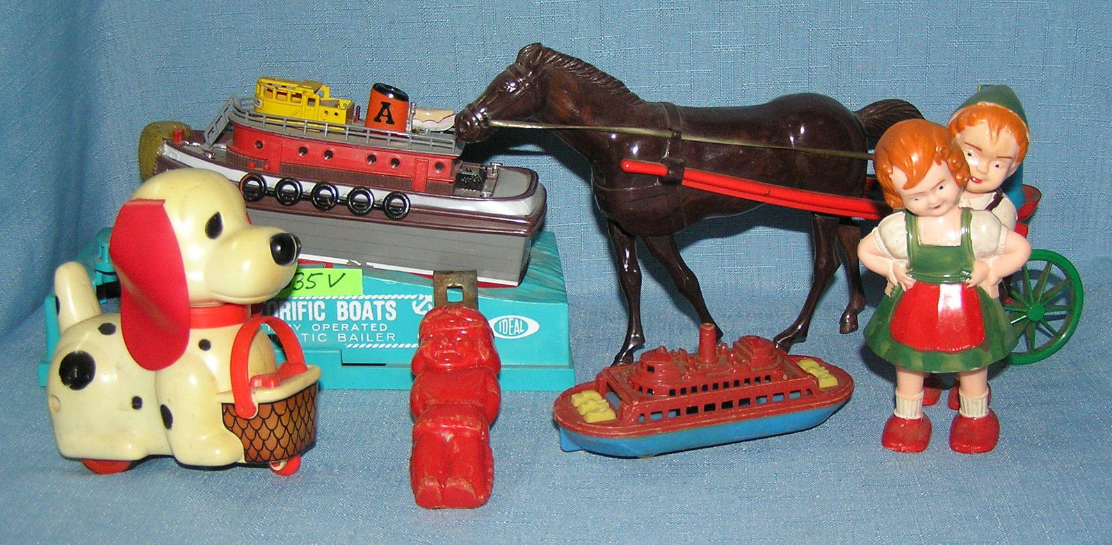 Vintage hard plastic toys and collectables: Group of 6 vintage hard plastic toys and collectables includes Ideal, Motorific boat and display, windup mechanical horse and rider toy, pair of ramp walokers, Rendwall river boat, mechanical Pappy to