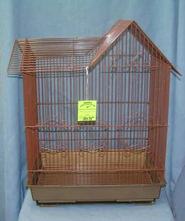 Vintage style all metal bird cage: Vintage style all metal bird cage with hard plastic base with clean out access drawer est. value $65.00-$75.00