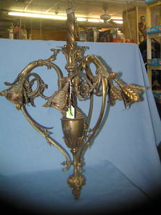 Solid brass chandelier with leaf decorations: Solid brass chandelier with leaf decorations est. value $400.00-$500.00