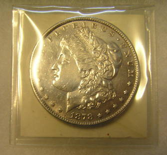 1878S Morgan silver dollar in AU condition: 1878S Morgan silver dollar in AU condition est. value $175.00-$200.00