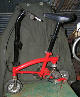 Modern miniature circus style bike: Modern miniature circus style bike, superior suspension with adjustable seat and handle bars est. value $150.00-$200.00