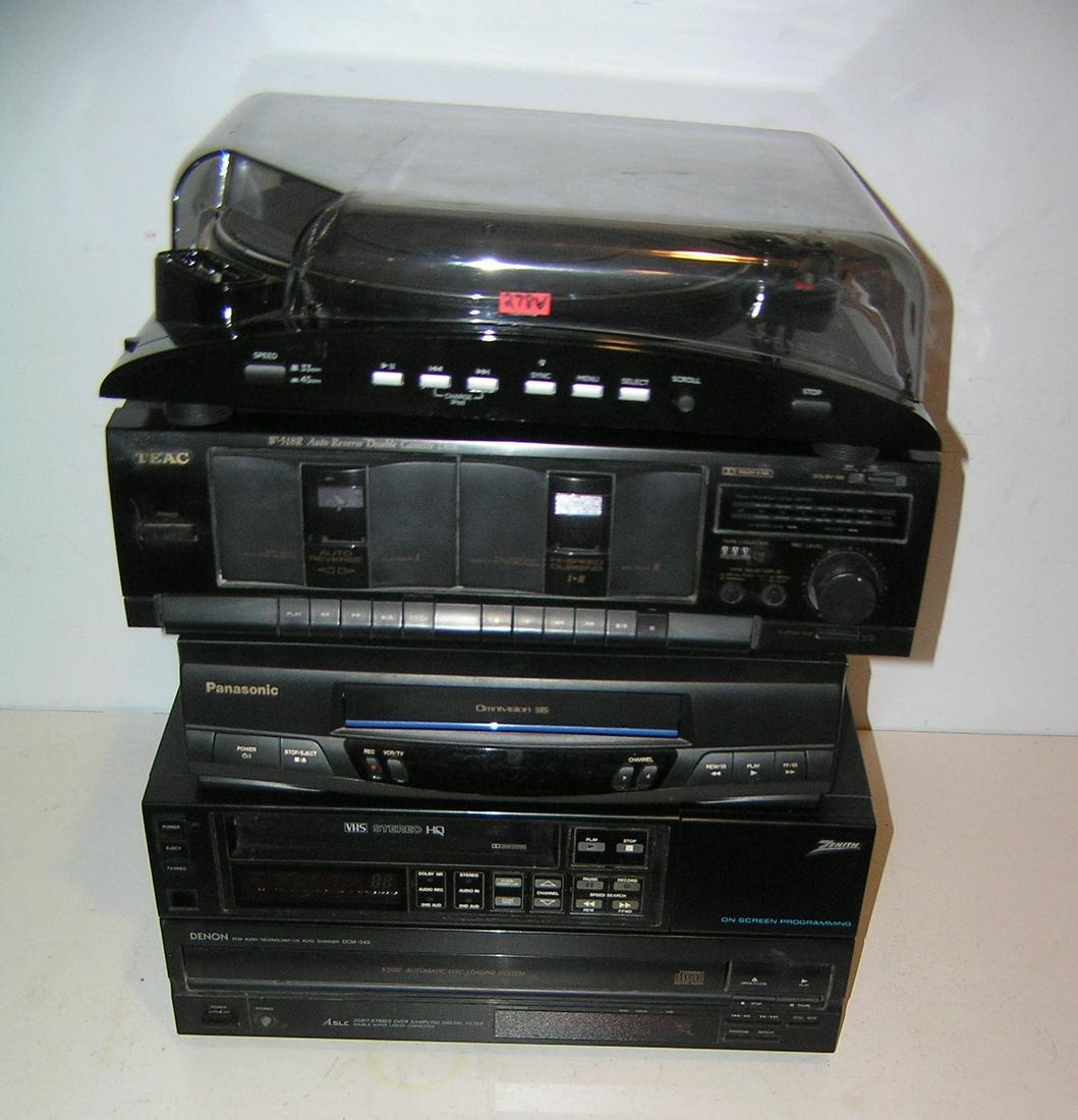 Group of modern electronics: Group of modern electronics includes Ion I Profile turn table, Teac auto reverse double cassette deck, Denon automatic disc loading system, Zenith onscreen programing VHS stereo an dPan asonic omnivis
