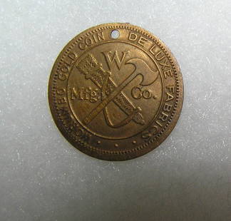 Worumbo fabric advertising sales company token: Gold toned Worumbo fabric advertising sales company token dated 1865 est. value $125.00-$150.00