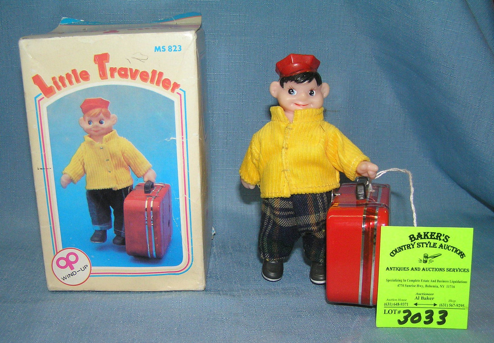 Great tin windup mechanical Little Traveler toy: Great tin windup mechanical Little Traveler toy all tin suitcase with rubber figure mint with original box est. value $80.00-$100.00
