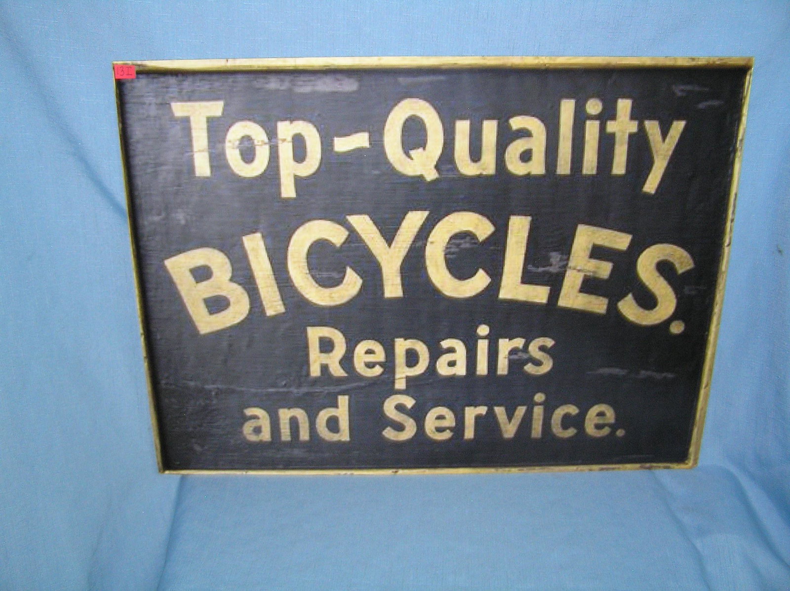 Top quality bicycles repairs and service retro style advertising sign: Top quality bicycles repairs and service retro style advertising sign large 20 inches by 30 inches printed on masonite board est. value $200.00-$225.00