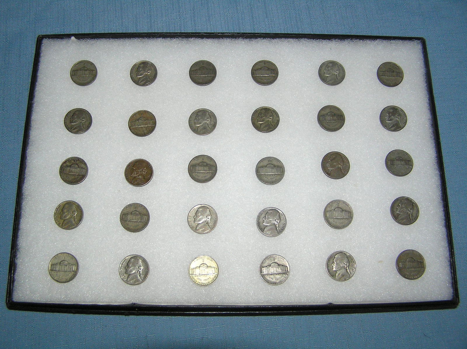 Collection of US silver war time Jefferson nickles: Collection of US silver war time Jefferson nickles all circa WWII with P, D and S mints includes 5 ounces of US silver est. value $125.00-$150.00