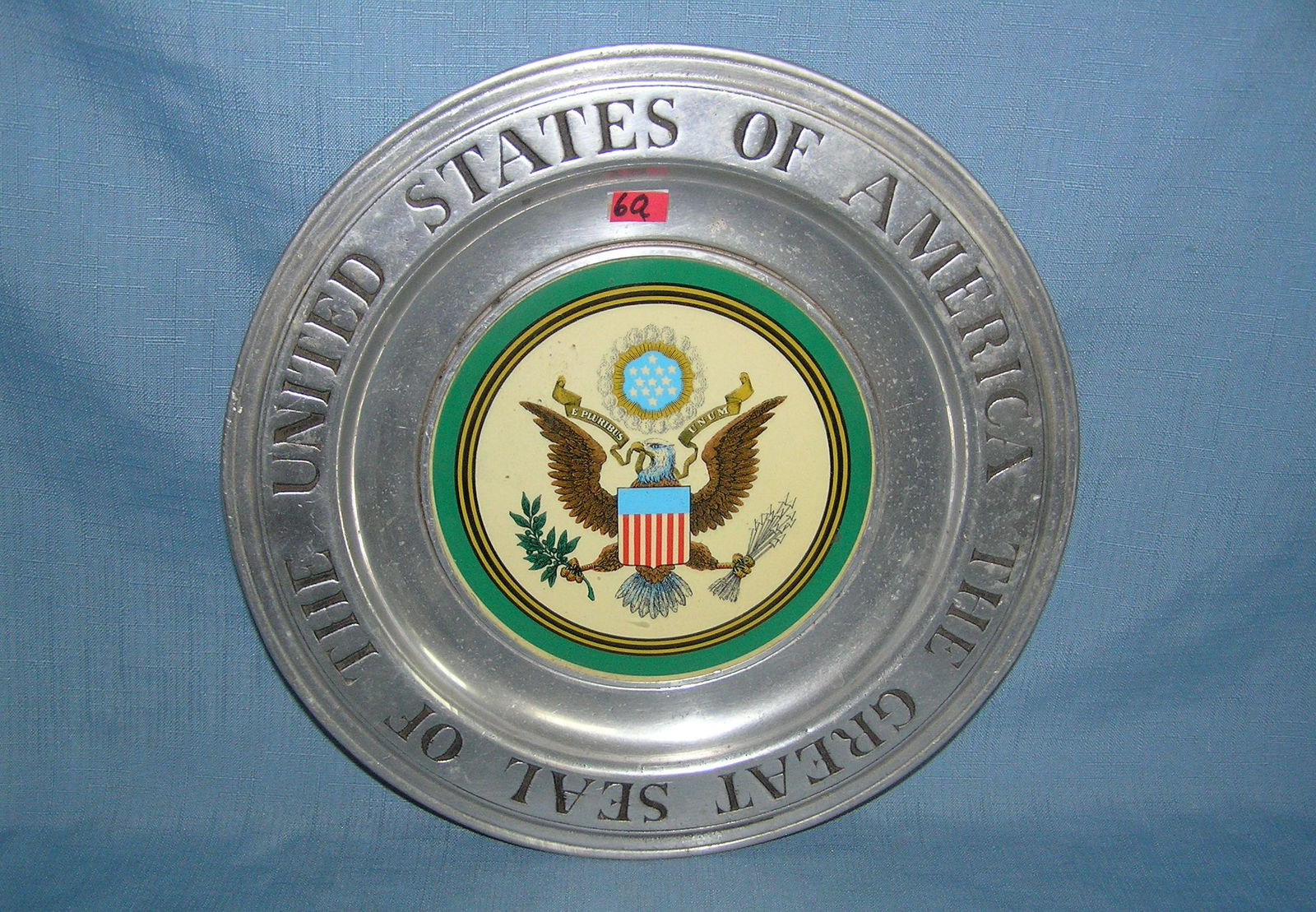 The Great Seal of the US cast metal display piece: The Great Seal of the United States of America heavy cast metal executives desk display piece est. value $80.00-$100.00