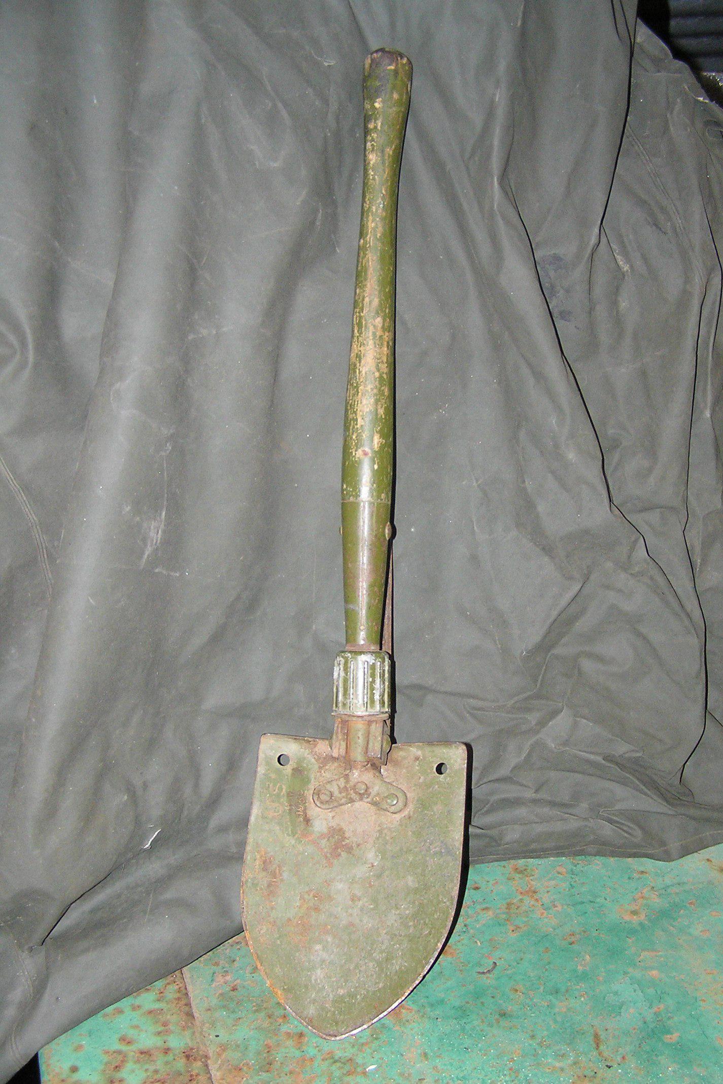 Korean War trench shovel US dated 1952: Korean War trench shovel US dated 1952 est. value $80.00-$100.00