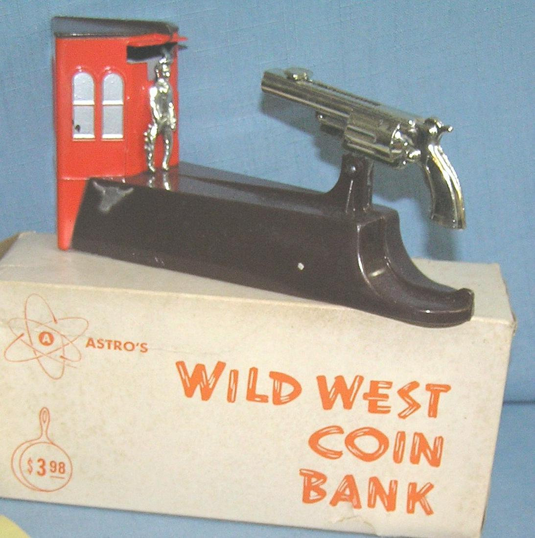Vintage Wild West bank circa 1950's: Vintage Wild West bank all hand painted cast metal circa 1950's with original key, box and documents est. value $200.00-$225.00