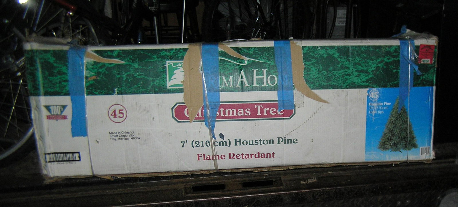 7 foot Houston pine flame retardant Christmas tree: 7 foot Houston pine flame retardant Christmas tree with original box est. value $100.00-$125.00