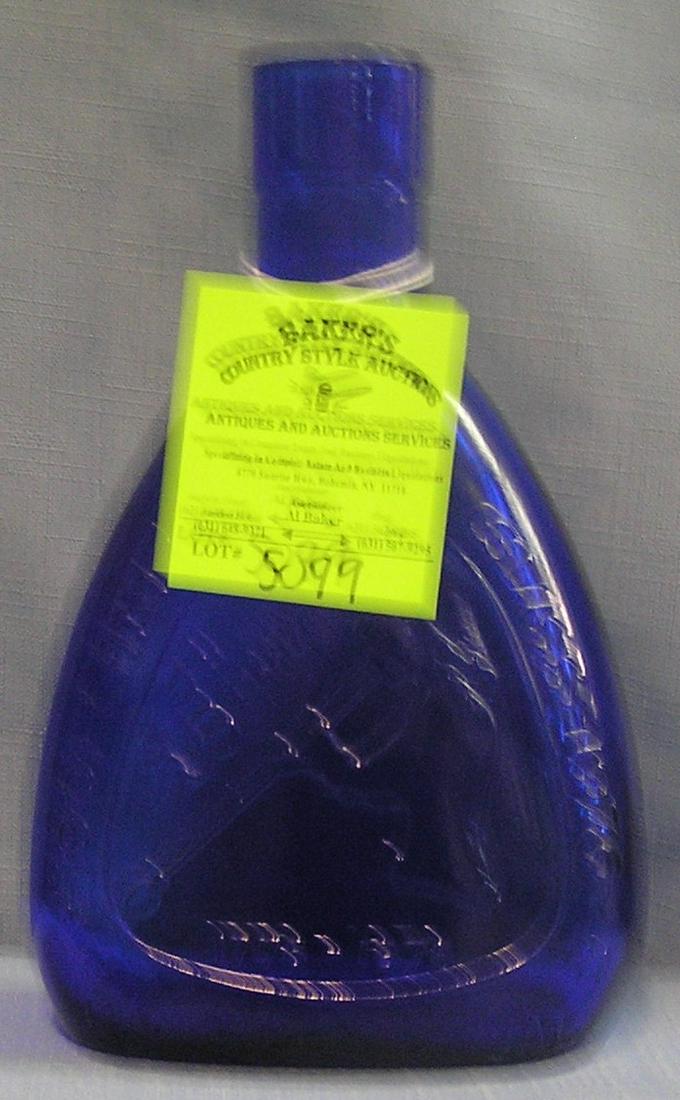 Bicentennial flask from the first American industry glass house: Cobalt blue bicentennial flask from the first American industry glass house Jamestown Virginia $50.00-$60.00