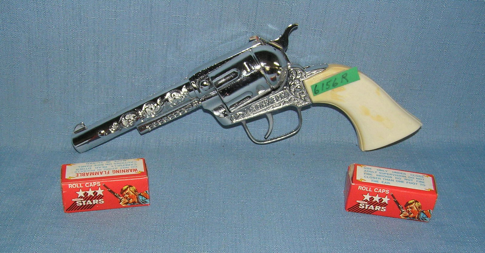 Vintage Pony Boy cap gun and 2 boxes of caps: Vintage Pony Boy cap gun and 2 boxes of caps, this gun is in near mint condition est. value $75.00-$80.00
