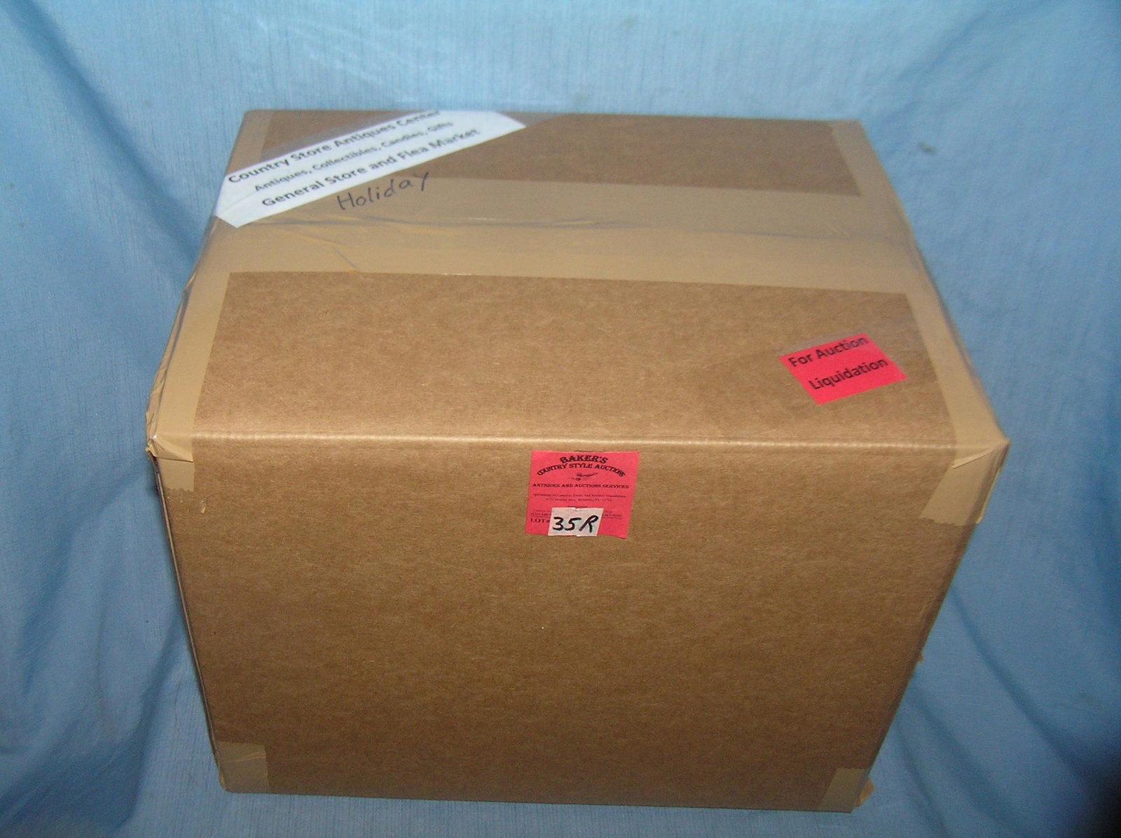 Moving and Storage Company mystery box lot: Moving and Storage Company mystery box lot marked Country Store Antiques Center: Antiques, Collectibles, Candies, gifts, General store and flea market holiday part of a moving and storage company seiz