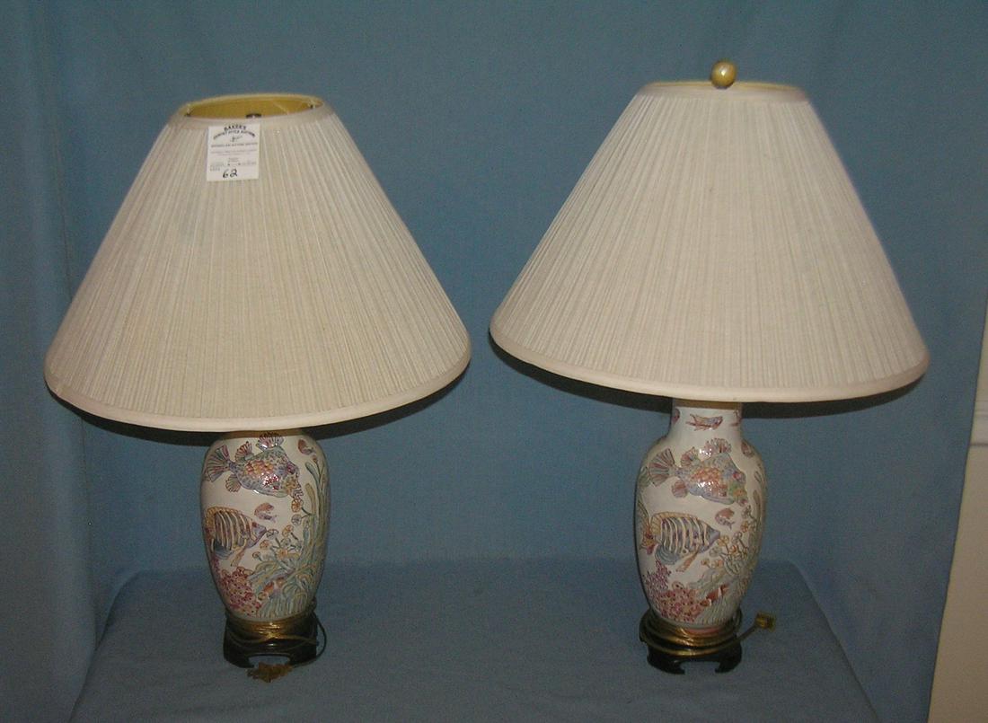 Asian themed fish decorated table lamps: Pair of porcelain Asian themed fish decorated table lamps est. value $150.00-$200.00