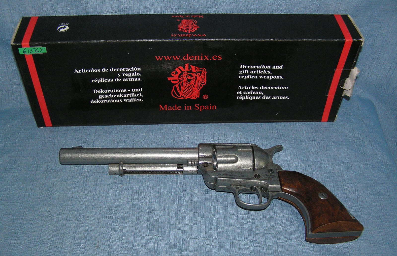 High quality Western revolver replica model collectors gun: High quality Western revolver replica model collectors gun all metal and wood with original box est. value $100.00-$125.00
