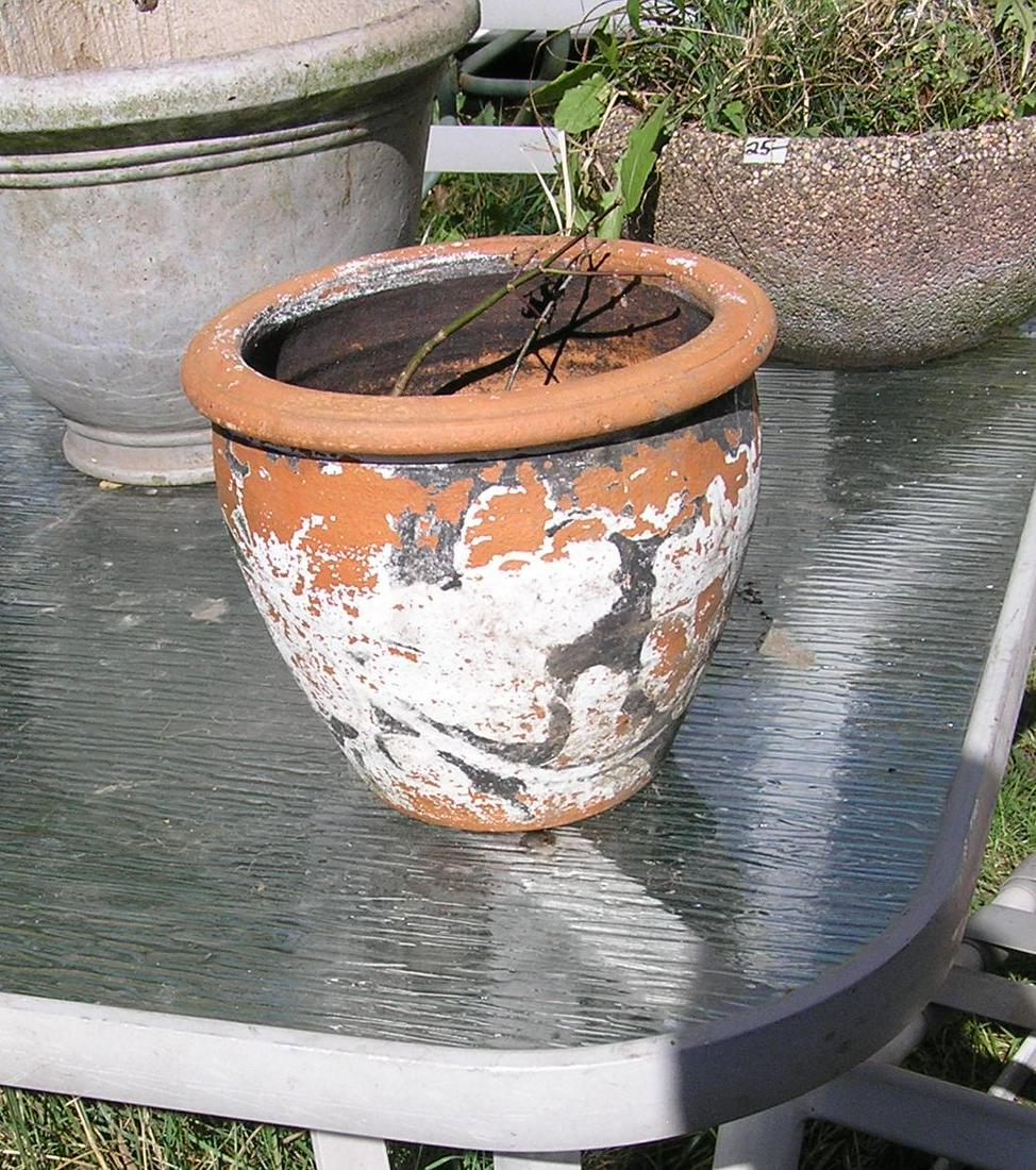 Larger earthenware planter: Larger earthenware planter 10 1/2 inches round by 7 1/2 inches high est. value $30.00-$35.00