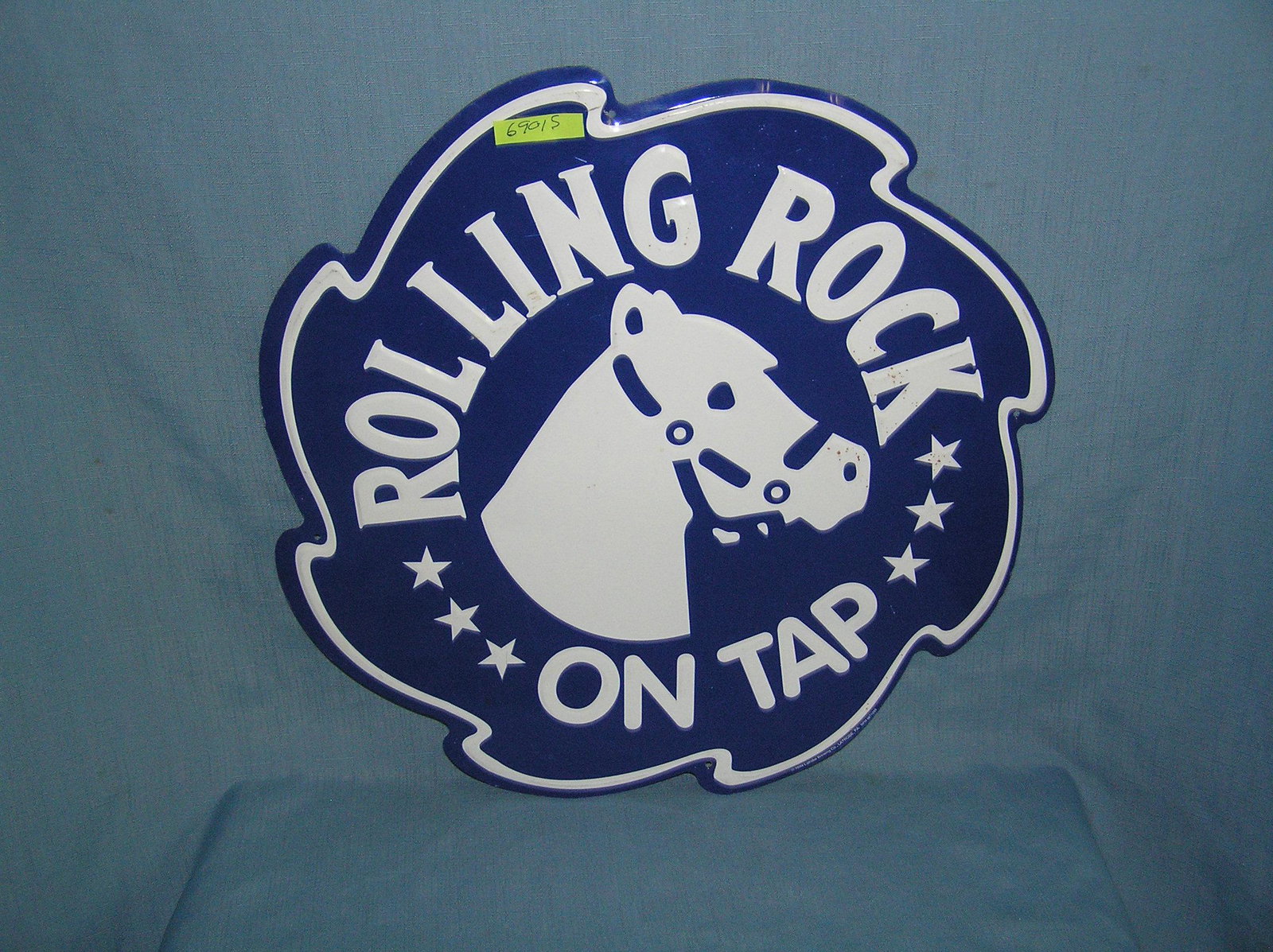 Rolling Rock on tap all tin advertising sign: Rolling Rock on tap all tin advertising sign 17 inches by 17 inches est. value $80.00-$100.00