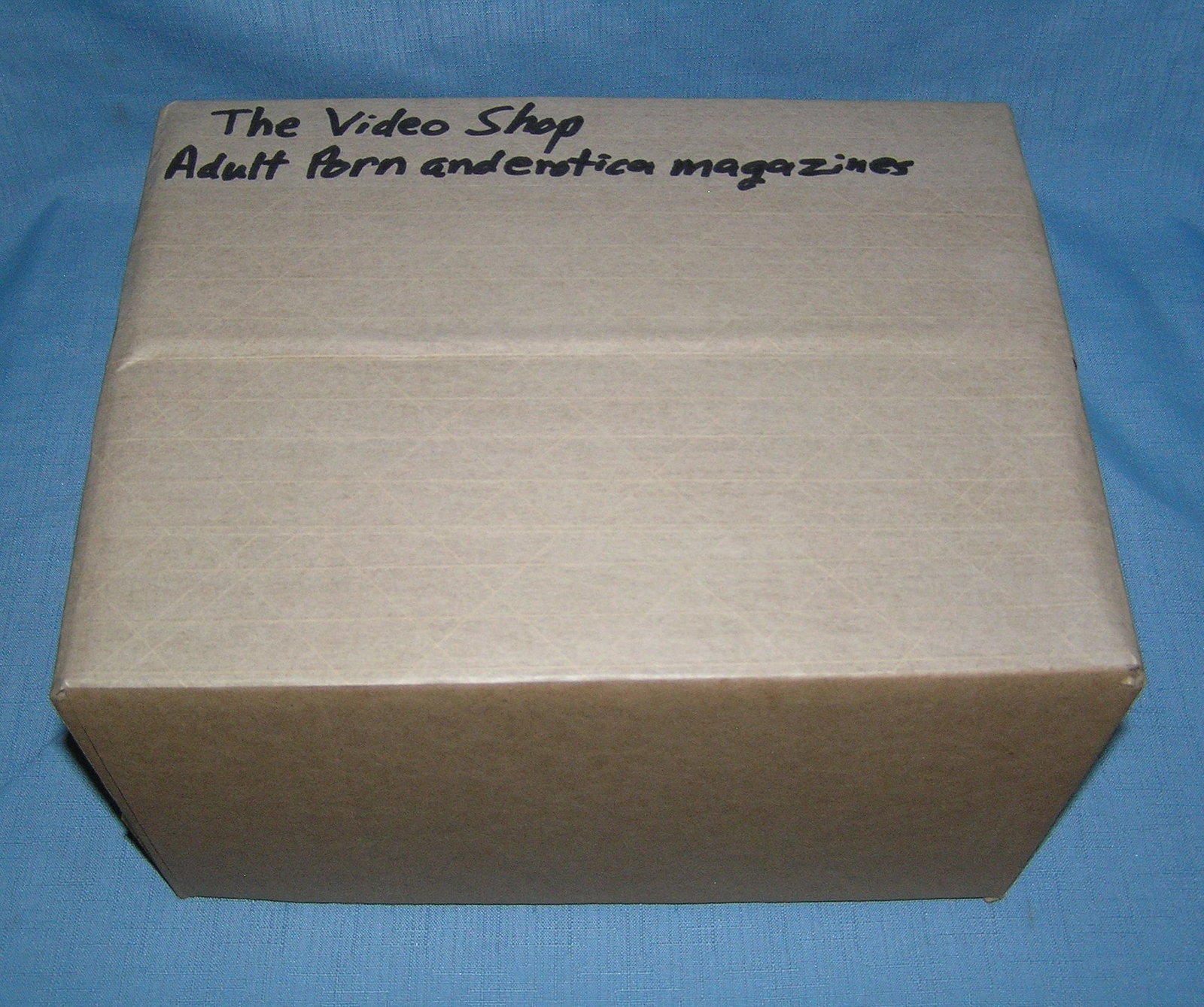Moving and Storage Company mystery box lot marked The Video Shop: Moving and Storage Company mystery box lot marked The Video Shop: Adult Porn and Erotica Magazines part of a moving and storage company seized or unclaimed merchandise group sent to auction for liquid