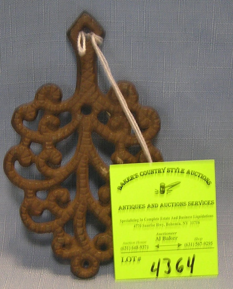 Antique cast iron trivet: Antique cast iron trivet est. value $25.00-$35.00
