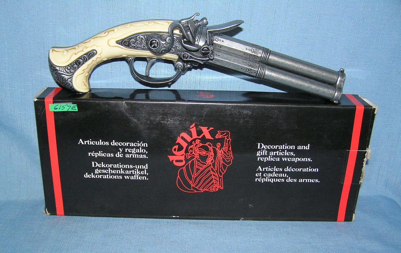 3 barrel flint lock style pistol replica model collectors gun: Super High quality 3 barrel flint lock style pistol with ivory style grip replica model collectors gun all metal and wood with original box est. value $175.00-$200.00