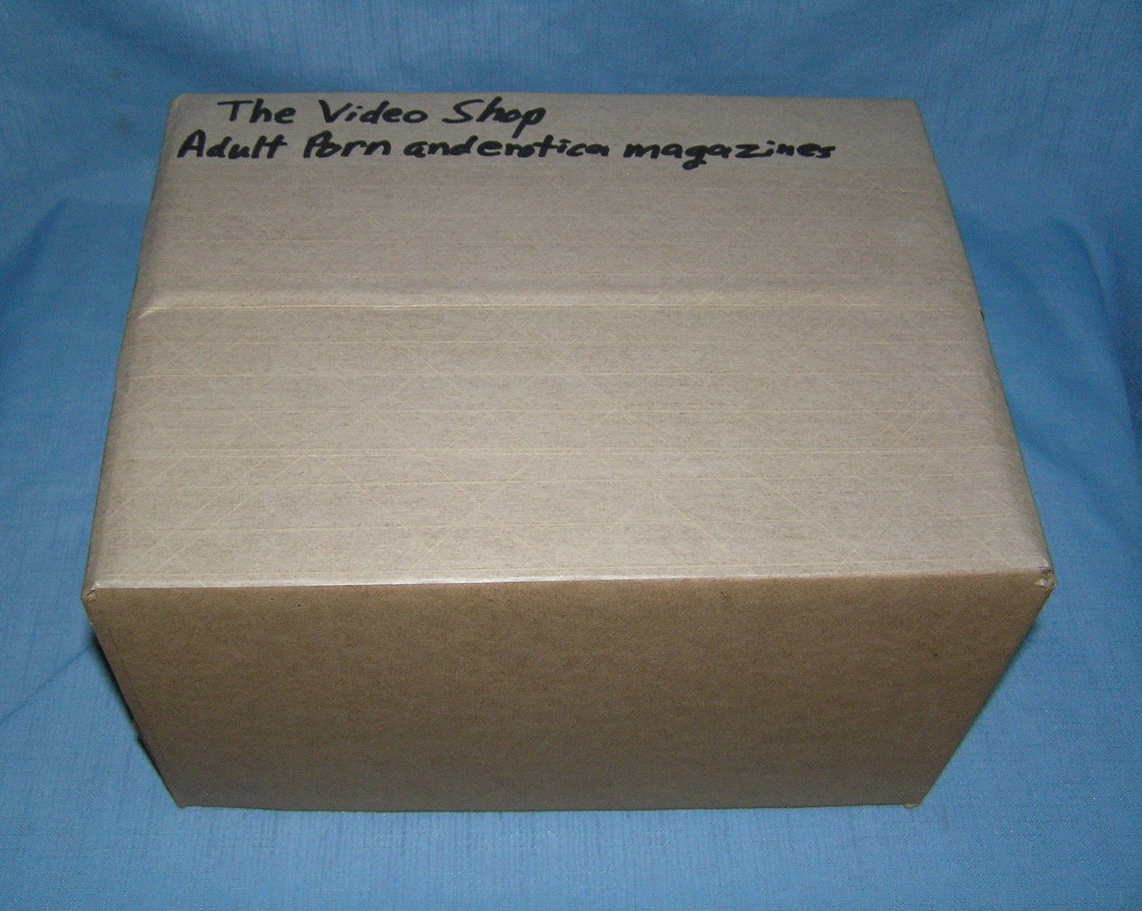 Moving and Storage Company mystery box lot marked The Video Shop: Moving and Storage Company mystery box lot marked The Video Shop: Adult Porn and Erotica Magazines part of a moving and storage company seized or unclaimed merchandise group sent to auction for liquid