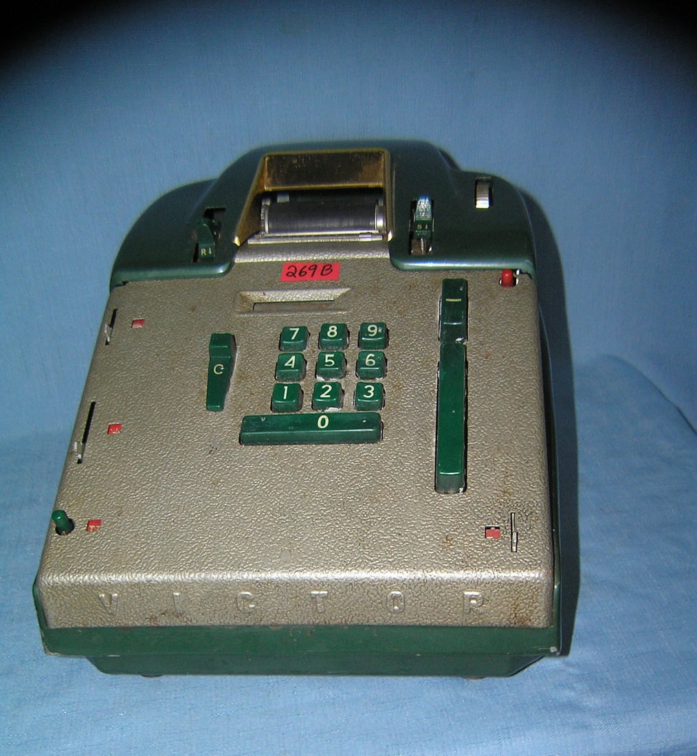 Great early Victor adding machine: Great early Victor adding machine brass, metal and Bakelite constuction made by the Victor Adding Machine Co. Chicago IL est. value $200.00-$225.00